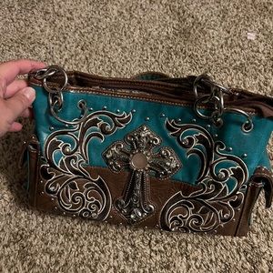 Teal and brown conceal, and carry purse